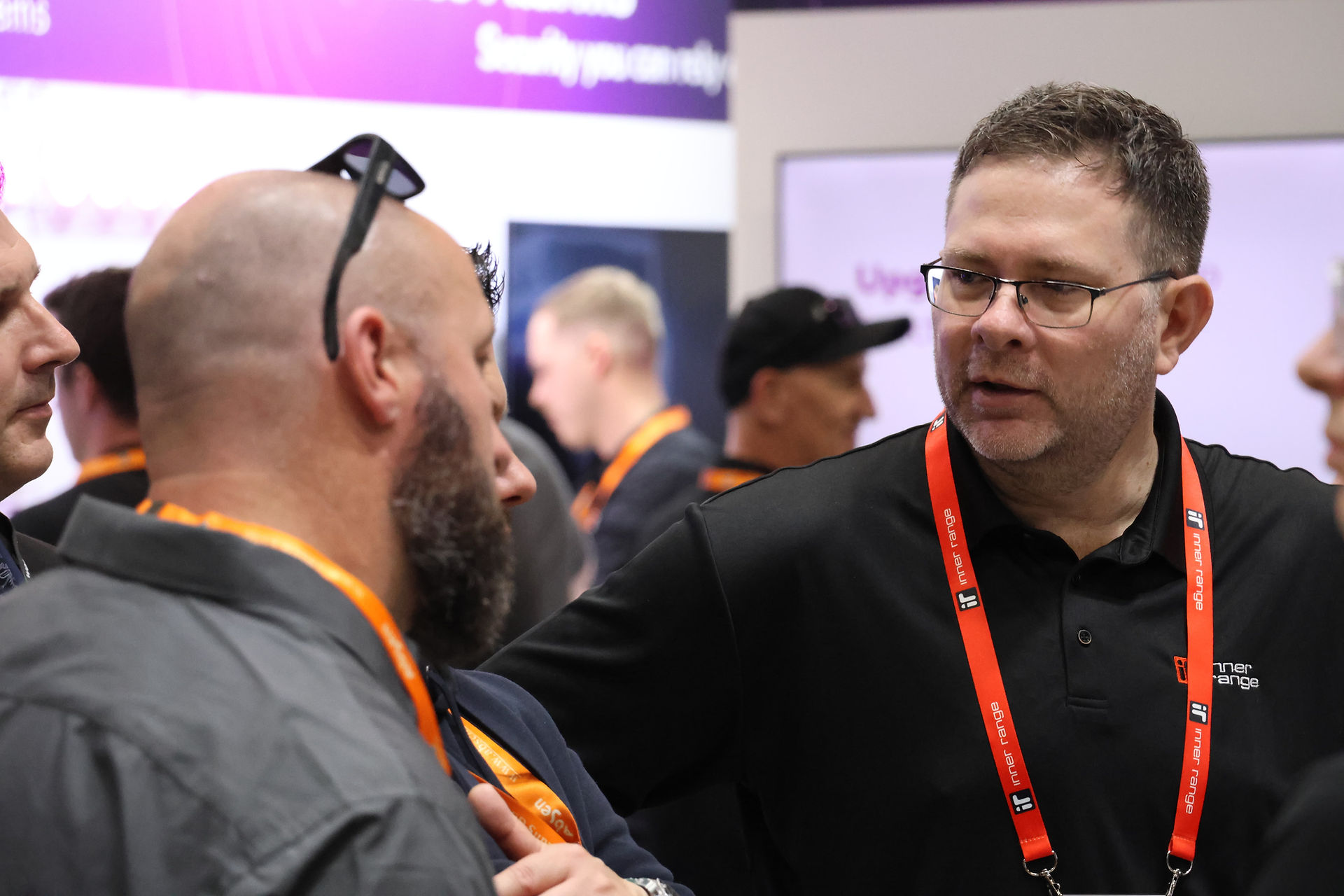 Malcolm talking with customers